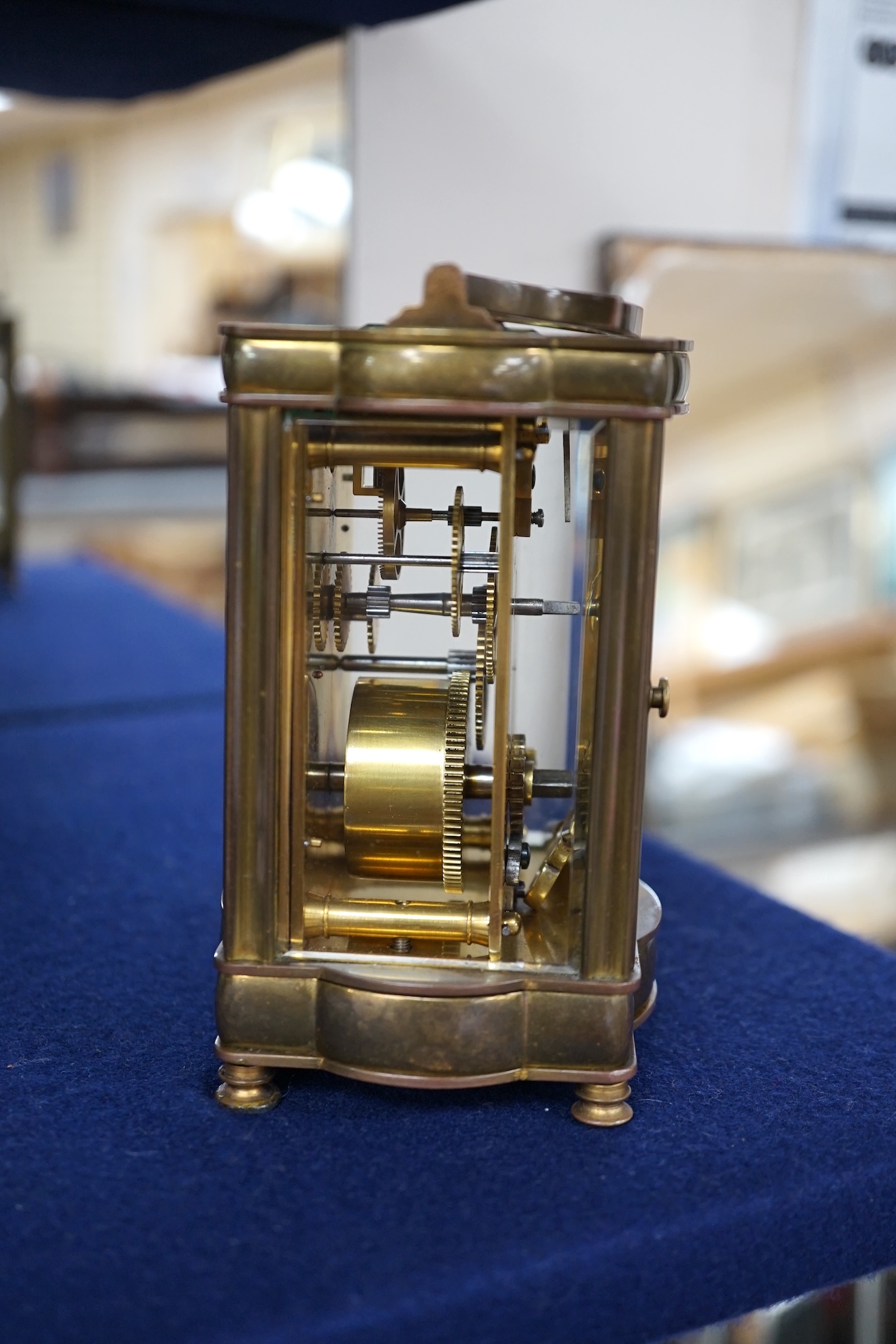 An early 20th century brass carriage timepiece with a fret worked ground, 12cm. Condition - good, but untested if working